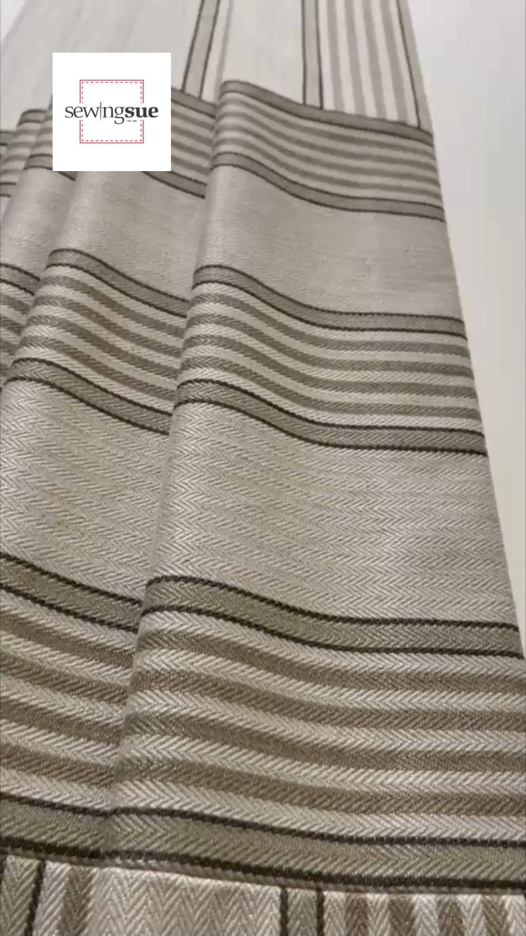 3 to 2 curtains.
Inserted striped fabric to create horizontal stripe near bottom of long curtains.